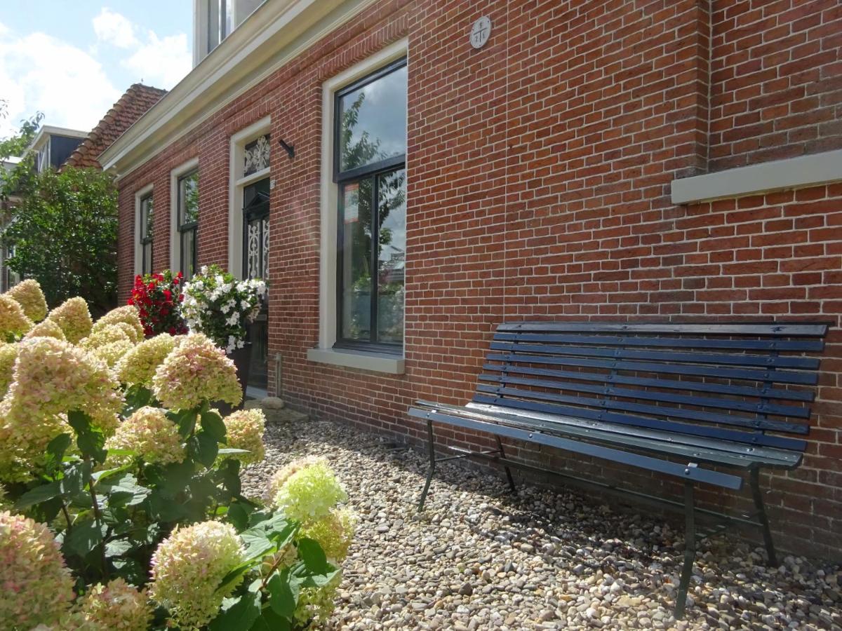 D' Ald Skoalle - Sfeervol Appartement In Oude School. Wijtgaard Extérieur photo